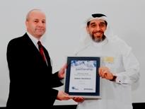 (L-R) Mr. Howard Beeken, Director EAME / CIS Distribution, Perkins presenting the Perkins Power Award to Mr. Mishal Kanoo, Deputy Chairman of The Kanoo Group.