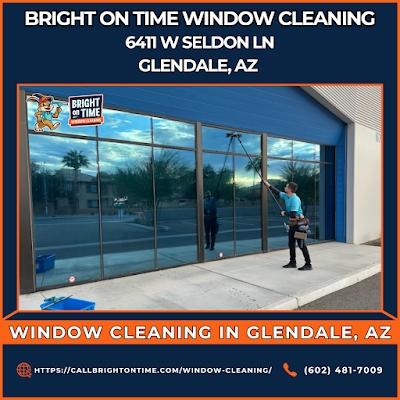Window Cleaning in Glendale, AZ - Bright On Time Window Cleaning. A Bright On Time Window Cleaning employee is seen cleaning large exterior windows of a modern business in Glendale, AZ. The worker, dressed in a professional uniform, uses a telescopic clea