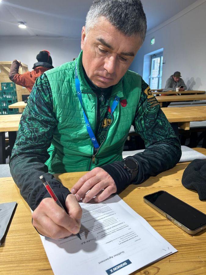 SKINION X (R) expands its international network in biathlon. Contract signing with Team Lithuania. ( (C) Heppner Apparel)