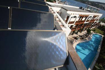 TiSUN modul collectors on the roof of the main building of Hotel Olira catch the sun’s rays for hot domestic demand and swimming pools and cover 99% of the hot water demand