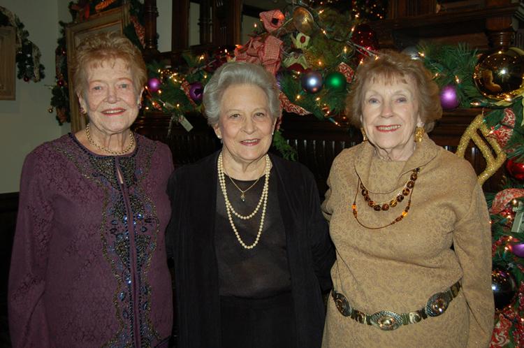 From L to R: Holiday Chairs Beth Yale, Aline Kuhnle, and Barbara Robison take some well-deserved time out for a photo keepsake of their hard work in planning Hillsides Guild's Holiday Celebration at the Parkway Grill. Photo by: Marisol Barrios/Hillsides