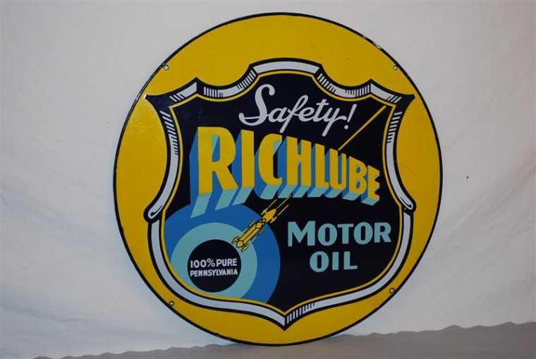 Richlube Motor Oil double-sided porcelain sign in remarkable condition, 24 inches in diameter ($9,350)