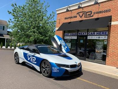 Drive home your dream vehicle with VIP Auto PA, the premier choice for the best car lease deals in Pennsylvania. This visual showcases our storefront and custom BMW i8, representing the premium selection and technical precision we bring to every transacti