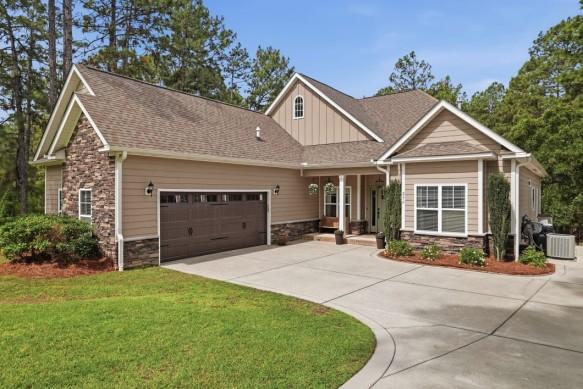 Love Pines Realty Lists One-Acre Southern Pines Retreat Backing