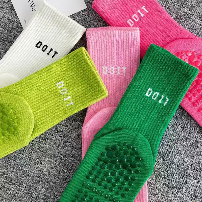 Downward Dog, No Slip - Why Yoga Socks Are Becoming the Studio's