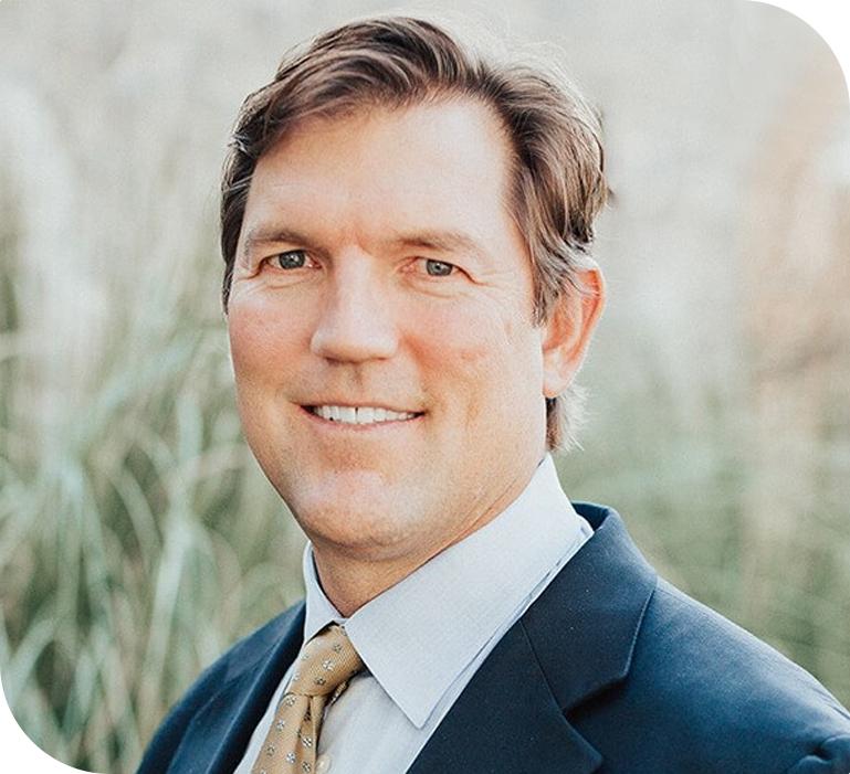 A patient consultation at Randall Dentistry focuses on dental implant options, oral health evaluation, and long-term tooth replacement planning.
