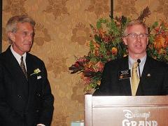Marc Gould, Executive Director of REBAC, inducts Tom Coler into the NAR REBAC Hall of Fame