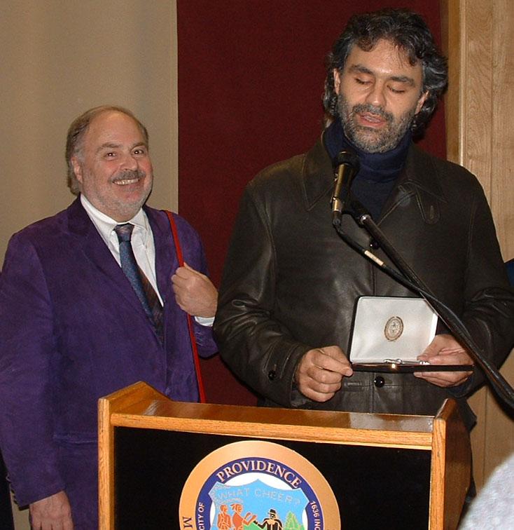 WebVisionItaly.com founder Ronald W. Del Sesto presents Italian tenor Andrea Bocelli with a proclamation from city of Providence, Rhode Island, USA.