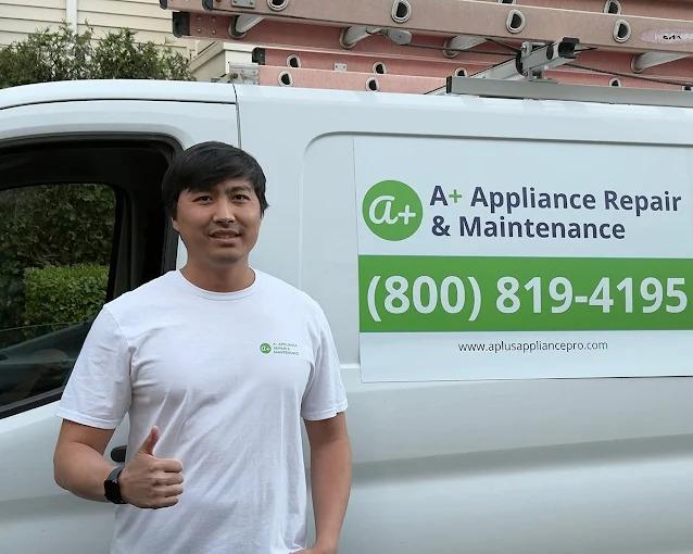 Samat Aidaraliev, owner of A+ Appliance Repair & Maintenance, beside a company service van.