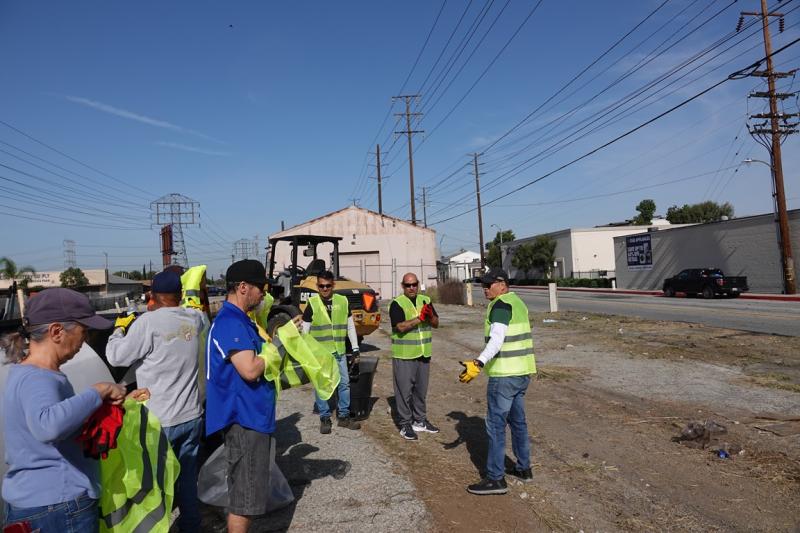 Community volunteers fitted with safety gear