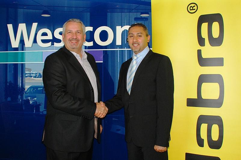 Steve Lockie of Westcon Group (L) shaking hands with Hanny Hanna of Jabra