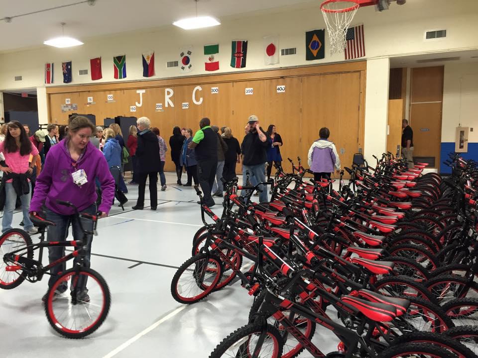 The bikes are set up in Wheeling Elementary?s gym by TMCA staff and volunteers to surprise kindergarteners after their graduation.