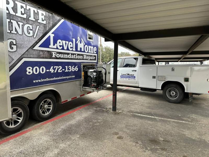 Level Home Foundation Repair trucks on site in Tulsa OK