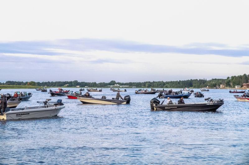 Warrior Boat owners tournament anglers waiting to submit fishing results