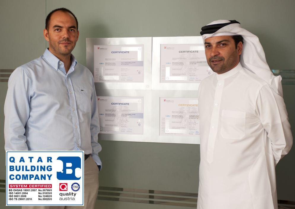 Managing Director Mr. Ali M.T. Mustafawi & QHSE Manager Mr. Serkut Akdeniz stand next to the four ISO / OHSAS Quality Certificates