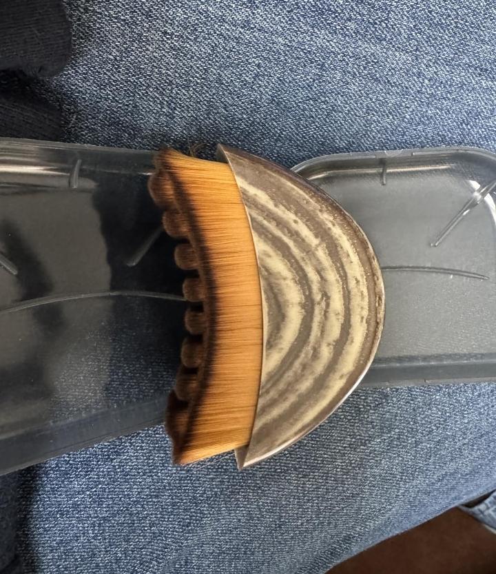 Contour face brush routine has helped female achieve achieve facial skin elasticity and firmness.