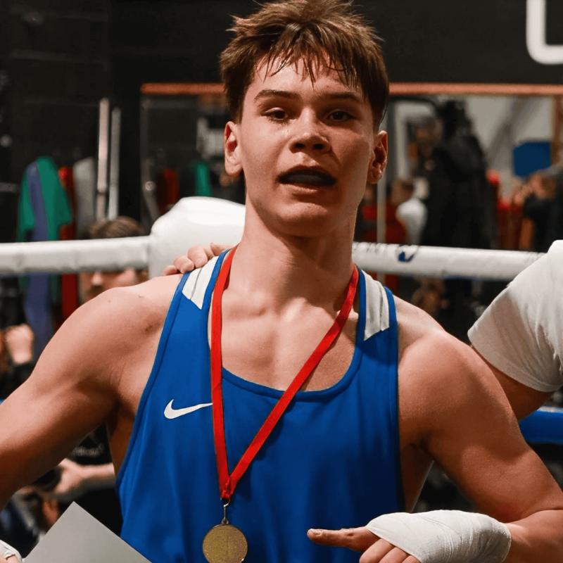 Rainers teaching boxing fundamentals and health-first training approach