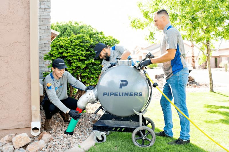 Pipeliners USA crew restoring underground pipes with trenchless technology in Mesa, Arizona without digging required.