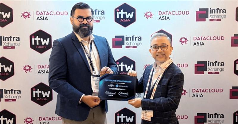 DCConnect Global's Charmond Tsang with IG Networks' Fernando Alonso at ITW Asia.
