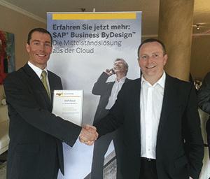 Caption: Pascal Nass (right, Head of Global Channel Development ? Cloud Solutions at SAP AG) congratulates Marius Wiesner (Sales M