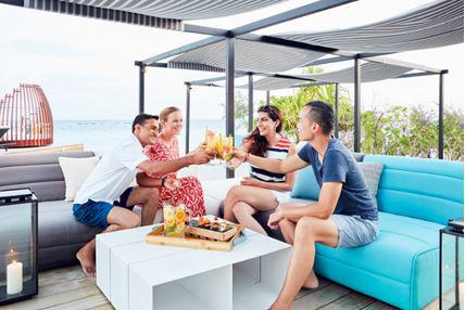 The Thari Bar at Amari Havodda Maldives is a great spot to catch up over a refreshing drink