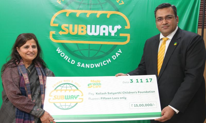 Mr Ranjit Talwar, Subway® Country Director, South Asia handing over replica of a cheque for Rs. 1.5 million to Mrs Sumedha Kailash