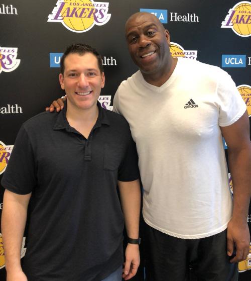 Press Pass Collectibles President, Kyle Bell, with Magic Johnson