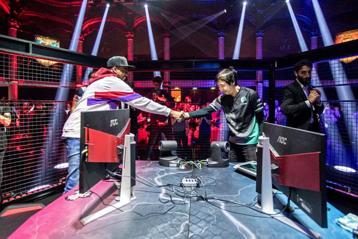 EVO Champion Problem X shakes hands with the winner Fujimura at the Red Bull Kumite World Final in Paris on November 11th, 2018
