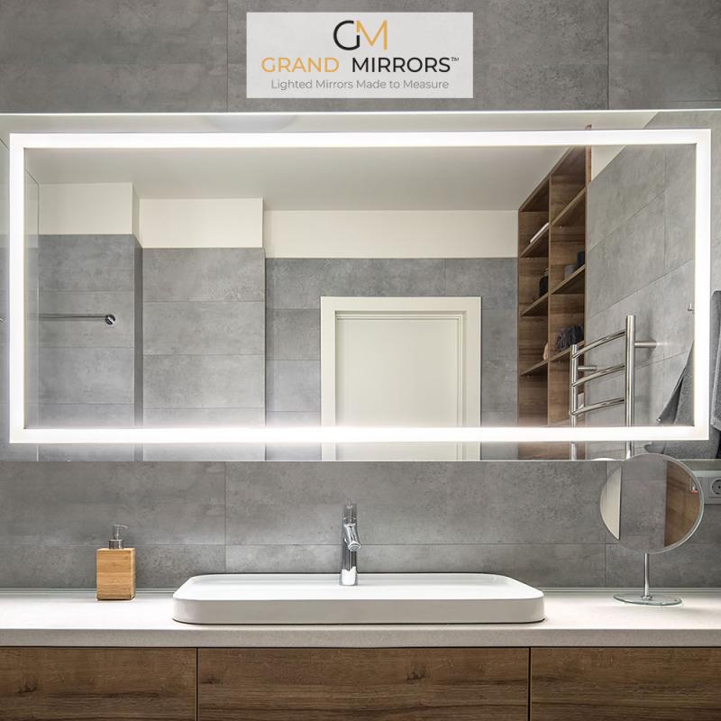 Grand Mirrors LUX with LED light installed in a bathroom