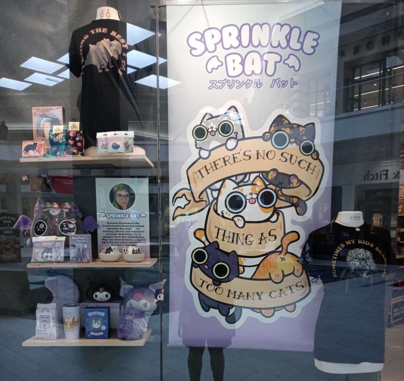 An eye-catching window display at Attic Salt's Austin location, features products from Sprinkle Bat, a recent Artist of the Month