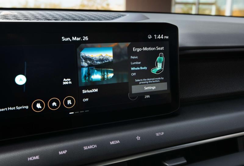 Row of surface touch buttons beneath infotainment system. (Source: KIA)