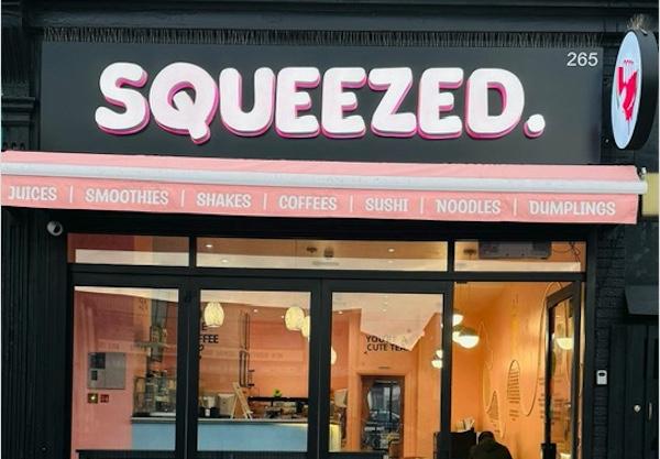 Vibrant scene at Squeezed, where the Sharma brothers lead a taste revolution with health-conscious cuisine and colourful pressed juices.