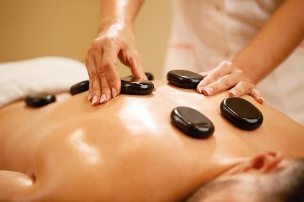 Massage Escape Offers Hot Stone Massage Therapy for Deep Relaxation and Pain Relief