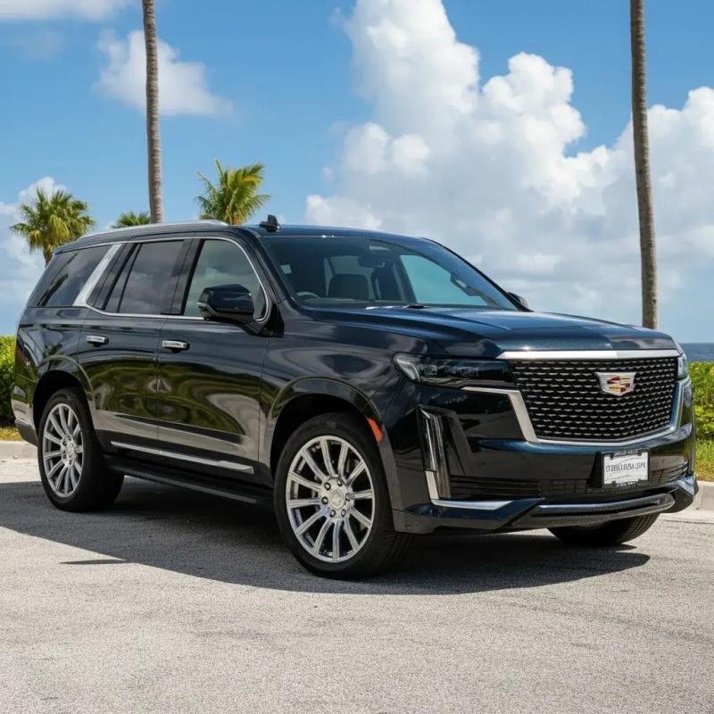 A sleek black Cadillac Escalade from Prestige Miami Express, representing the company's luxury ground transportation services in Miami. The vehicle reflects sophistication and comfort, perfectly suited for airport transfers, business travel, and special o