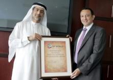 Mr. Mohammed Sharaf, CEO, DP World presenting the ‘3 x 3’ Award to Mr. Nader Atout, Managing Director – Gulf Region, Dimension Data