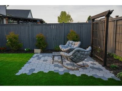 The image showcases a modern and meticulously designed small outdoor living space, which is the exact kind of custom outdoor living project that Angkorscape, Inc. specializes in.