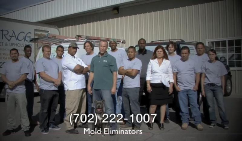 Mold Eliminators team standing outside of their office.